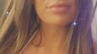 Dani Lyn showing off her perfect fake tits in a bikini top:)