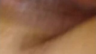 Masturbating