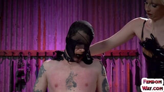 BDSM latex dominas spanks sub with her gloves hands
