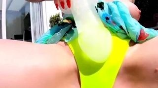 Red XXX masturbates poolside with an ice dildo