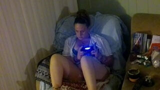 Step mom smoking cigarette and playing video games in her bra and panties (Part 2)
