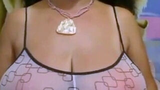 Big-Breasted Black Mature Woman Shows Off on Webcam