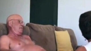 Granny Gives Her Husband a Hand Job at Home