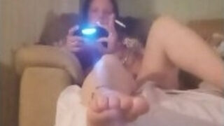 Mamacita horny and playing video games while getting her panties wet