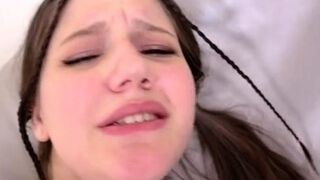 Pink labia close up of naive brunette playing with her name