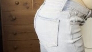 Topless in tight jeans pulling my pants down to show my big ass in tiny thong
