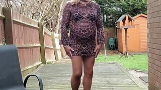 Sexy Crossdresser Kellycd2022 outdoors in tan seamless pantyhose and leopard print backless dress