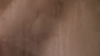 The mature stepmother figure, Gigi Dior, is now tending to a large new phallus.