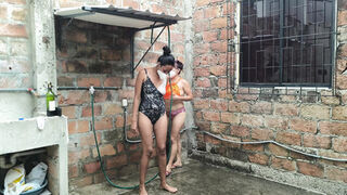 They wet their mature and sexualized bodies in their neighborhood's shower.