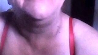 Brazilian granny shows her tits